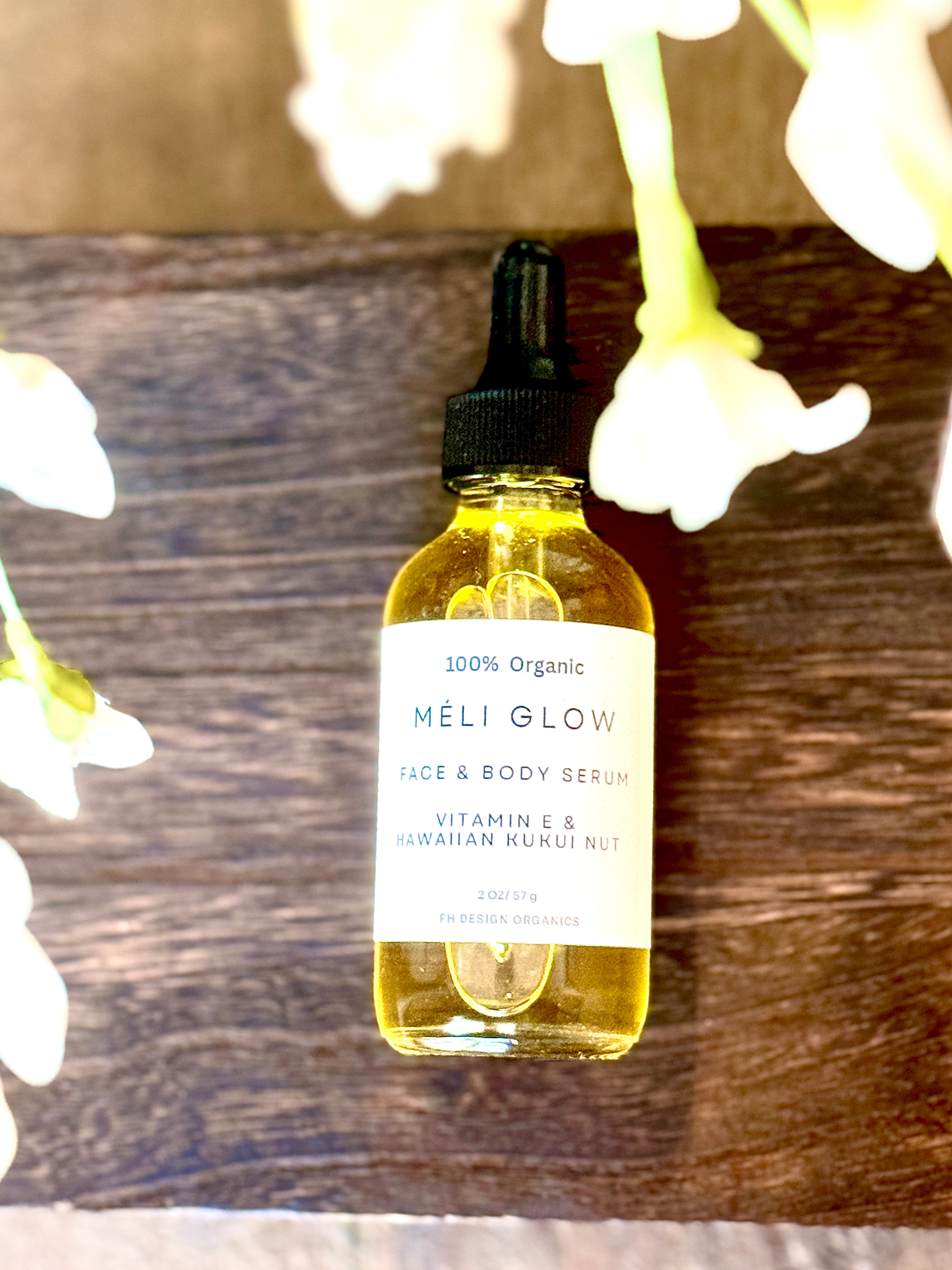 Glow + Sculpt Ritual Duo | 2oz Méli Glow Serum + Stainless Steel Gua Sha