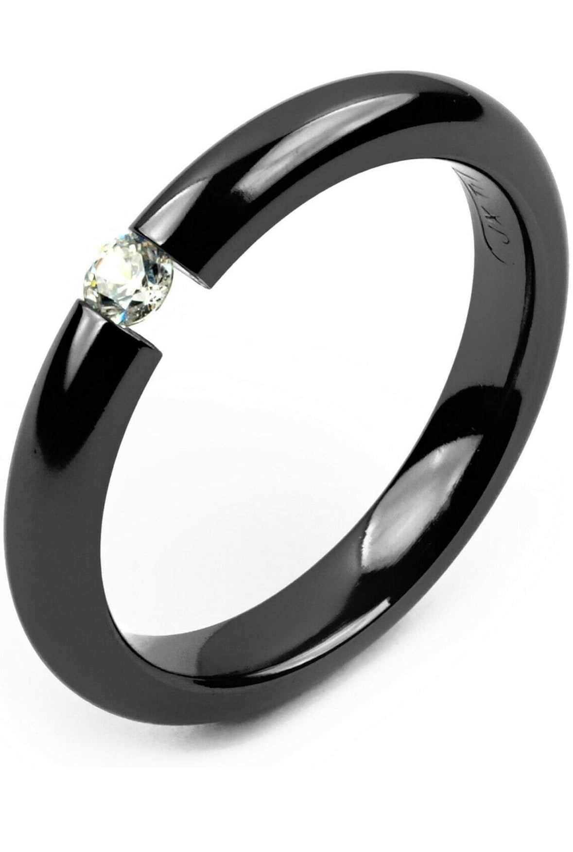 Minimalist Black Stainless Steel Gap Ring with Simulated Diamond Accent

Description:
This exquisite ring features a modern black stainless steel band with a bold open-gap design, showcasing a stunning simulated diamond centerpiece. The perfect ble