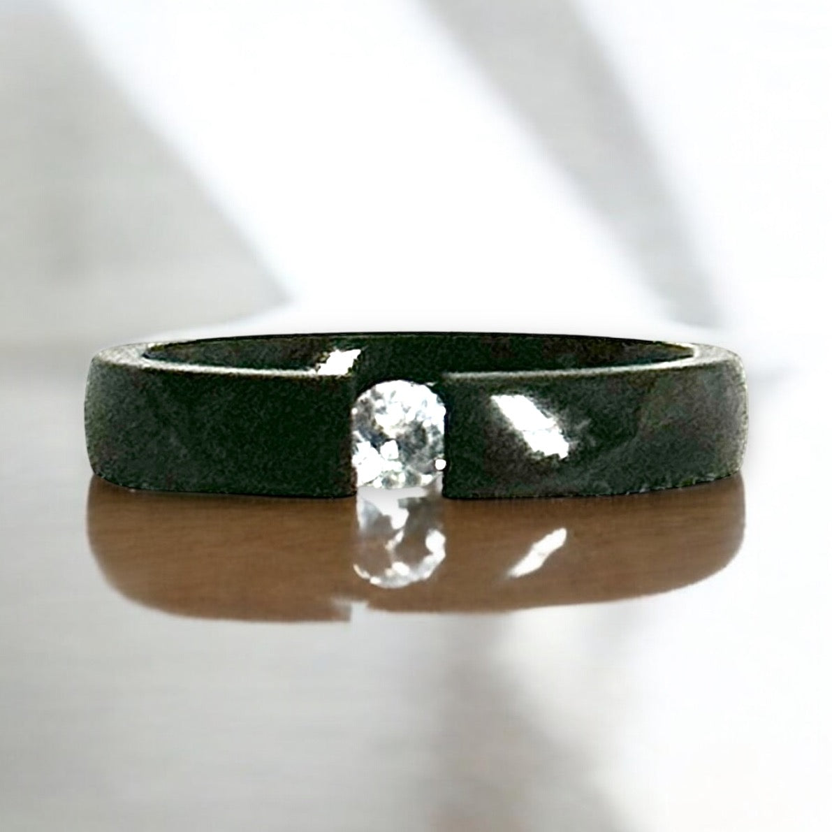 Minimalist Black Stainless Steel Gap Ring with Simulated Diamond Accent

Description:
This exquisite ring features a modern black stainless steel band with a bold open-gap design, showcasing a stunning simulated diamond centerpiece. The perfect ble